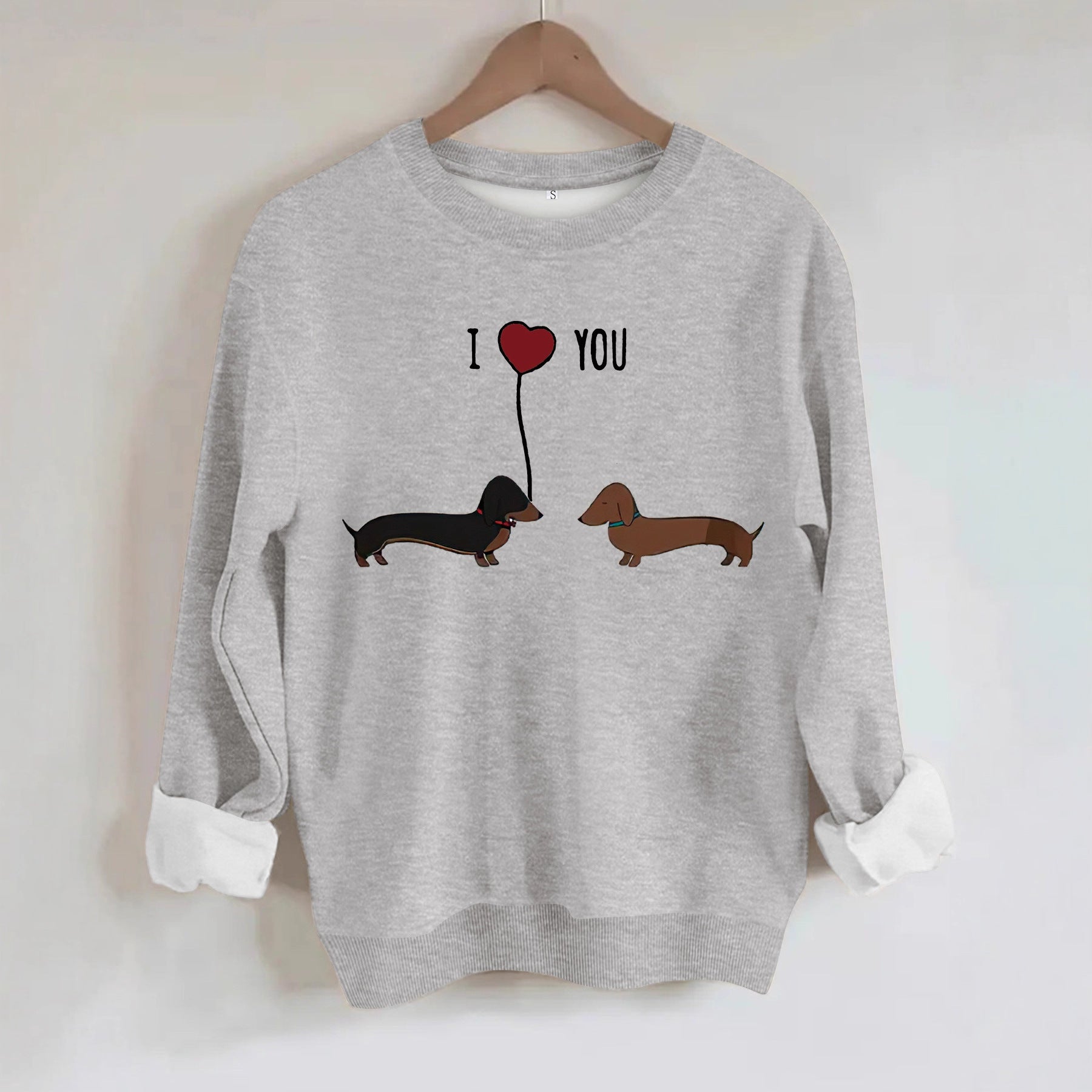 Two dog print hoodies featuring a 'I Love You' graphic, designed in a casual gray color, perfect for street fashion.